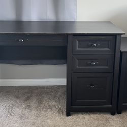 Black desk and nightstand