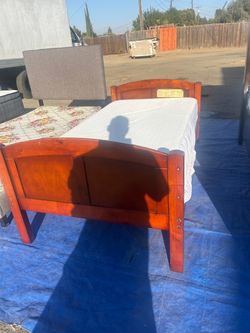 Twin bed frame with mattress