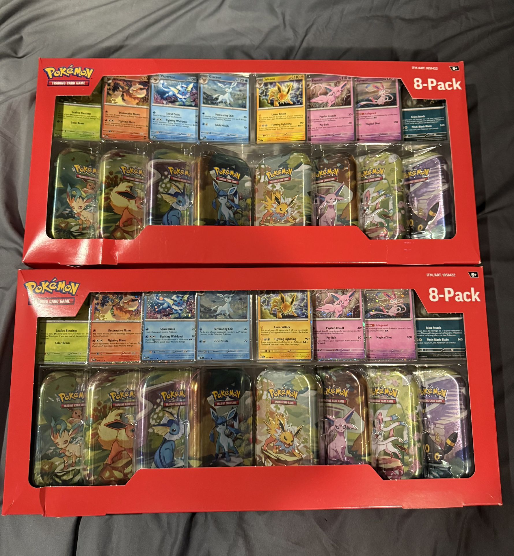 Prismatic Evolutions Costco 8 mini tin bundle