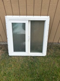 White Vinyl Sliding Window with Privacy Glass