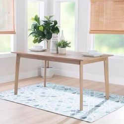 Natural wood dining table