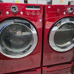 LG 4.5 Cu. Ft. Smart Front Load Washer And Dryer 7.4 cu. ft. Stackable whit Pedestals.