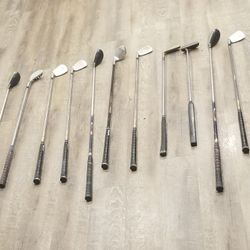 12 Golf Clubs, Bag, & Misc
.