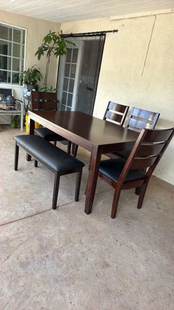 Dining table and 4 chairs one bench like New