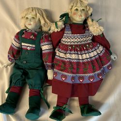 Two Orma Porcelain Christmas Dolls