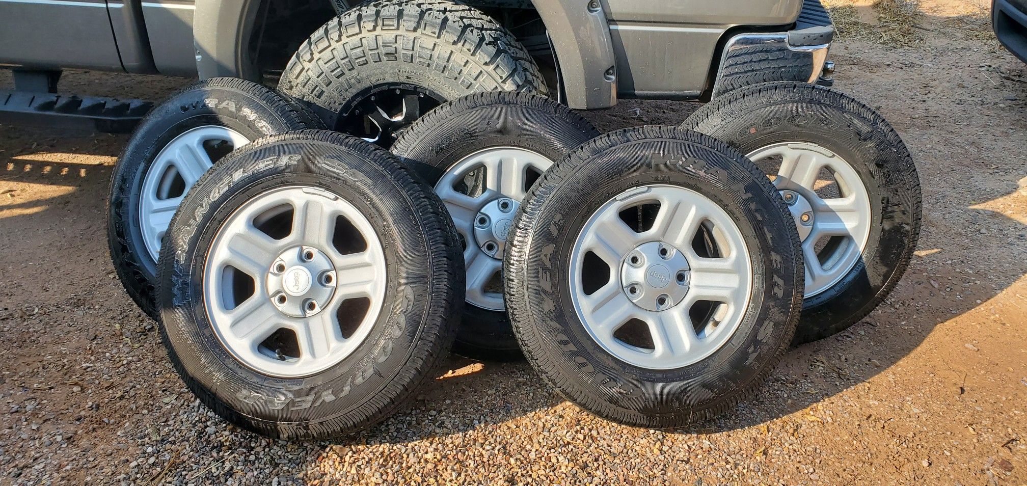5 Jeep Wheels and tires $250.00