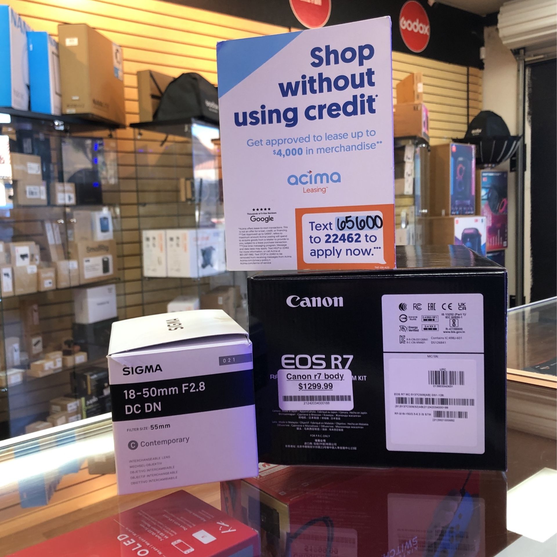 Canon EOS R7 Camera w/Sigma 18-50mm F2.8 Travel Pro Combo