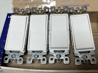 Four 3-Way white Decora 15 Amp Switches