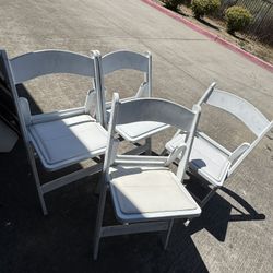 4 Plastic White Chairs 