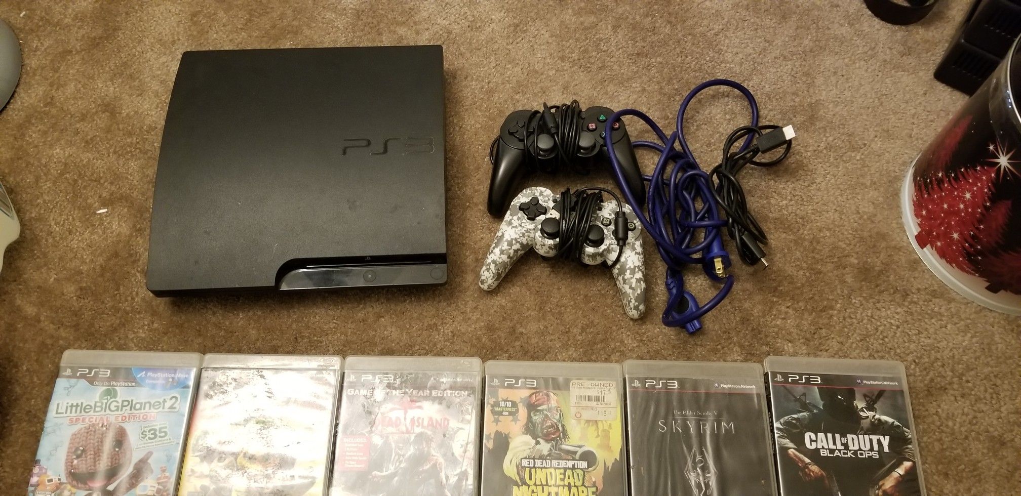 PS3, 17 GAMES & 2 REMOTES