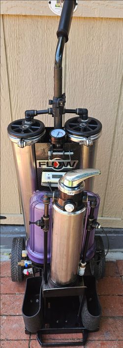 FLOW multi-stage Reverse Osmosis and Deionization (RO/DI) pure water filtration system. It is a highly specialized piece of mobile equipment used prim