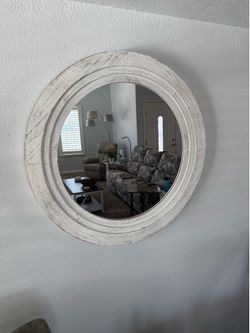 Oval wall mirror