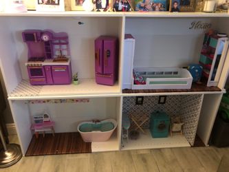 Doll house and a school house with a ice cream truck