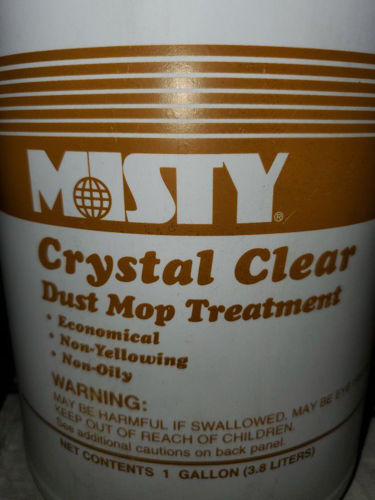 Dust mop treatment 