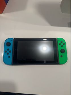 Nintendo Switch (with 5 controllers, 4 bumpers, 2 controller adapters, docking station, controller charger, carrying case, and three games)