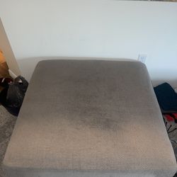 Gray ottoman with storage