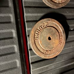 60 bucks for all four  22.68kg  50 pounds each weight