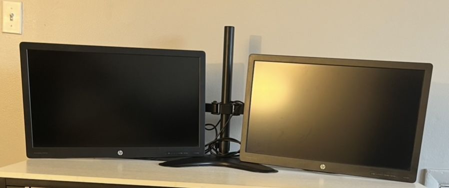 Two HP desktop Screens 24” size With Double Stand And Cables