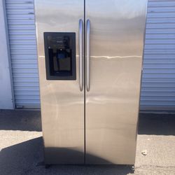 GE side by side stainless steel refrigerator in good condition clean and nice one month warranty deliver available W36-D31-H69