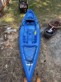 Sit on top Kayak with cart and paddle