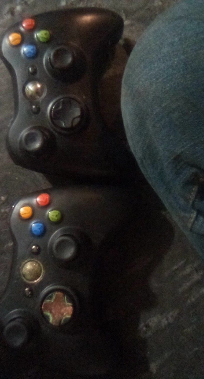 2 Xbox 360 Wireless Controllers, 1 original 1 bought From Game-xchange