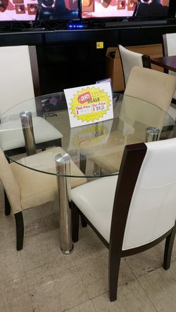 48 in Glass table with 4 chairs