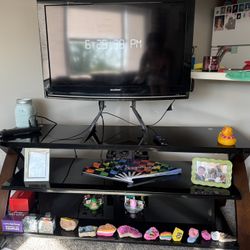 tv stand and tv with roku