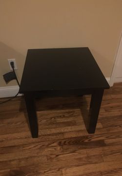 black wood coffee table (available as pair)