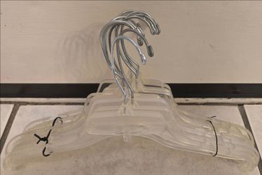 PLASTIC HANGERS WITH TOP ROTATING METAL HOOK