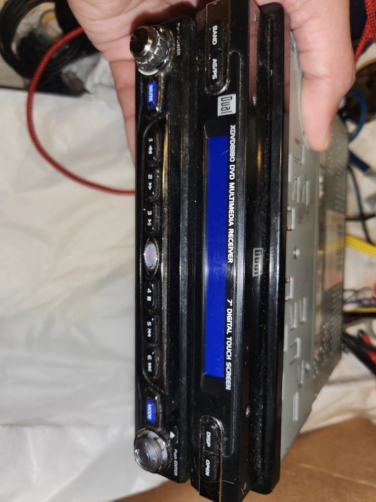 The DualĀ® XDVD8180 is an AM/FM/CD/DVD receiver that produces a Fully Motorized 7-inch TFT LCD screen