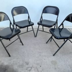 4 Folding Chairs 