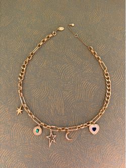 aerie golden charm chain necklace with 5 charms heart, crescent, stars, oval stone with adjustable chain  In excellent condition