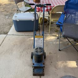 Towel and floor scraper