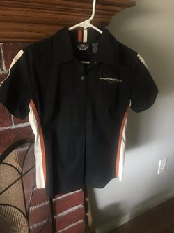 Harley Davidson women’s mechanic shirt size Medium in good condition.