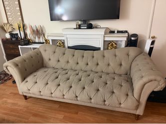 1 year old couch for sale. Negotiable
