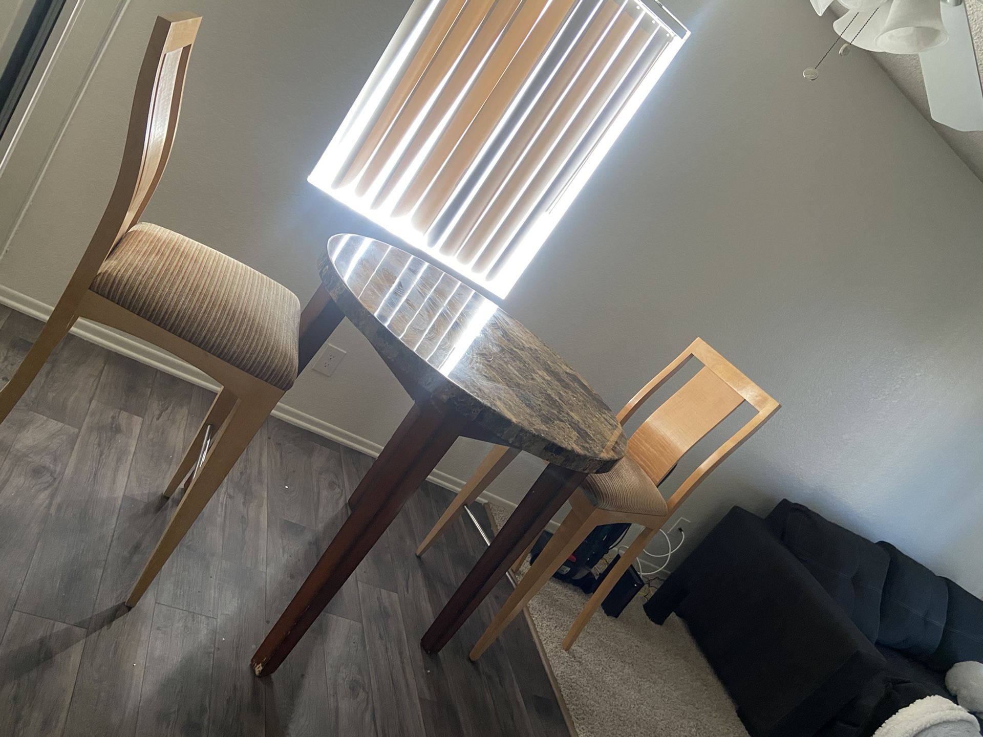 Table and two chairs price going for $100 for everything. In good condition. *pick up only*