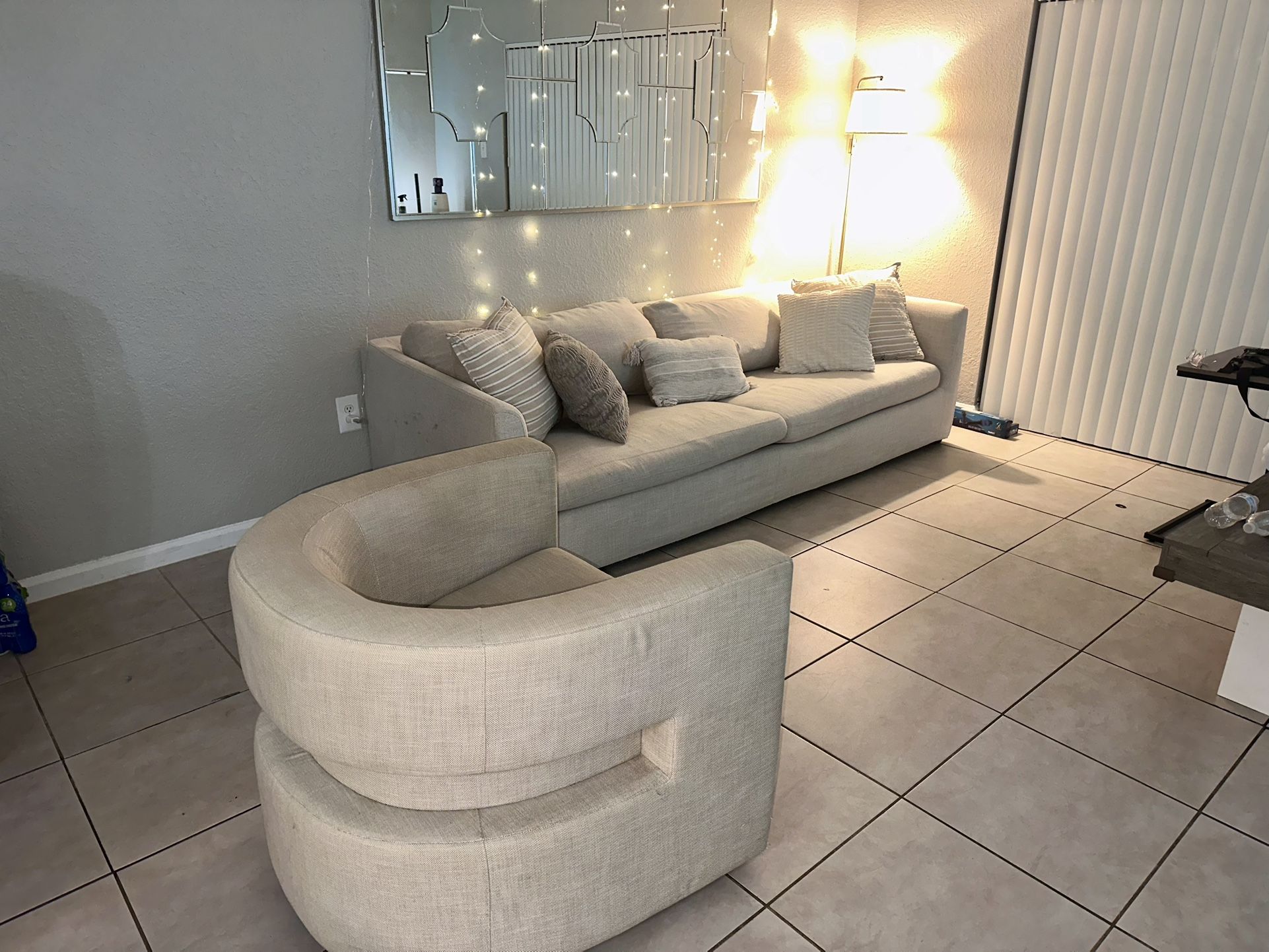 Light beige sofa and swivel chair set