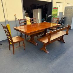 6 -Piece Solid Wood Dining Set Extendable Table with Power Outlet, Bench and 4 Chairs Good Condition