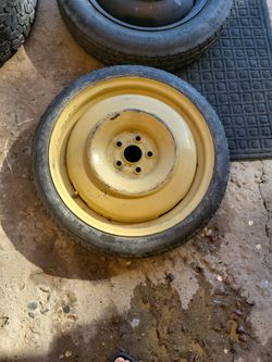 (2) 5x100 DONUT SPARE TIRES