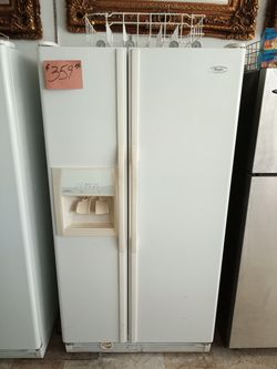 Whirlpool Side by Side Refrigerator White excellent . Warranty , Delivery available 2203 Fowler st. Ft. Myers 33901