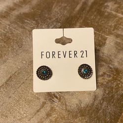 Pre-owned turquoise stud earrings.