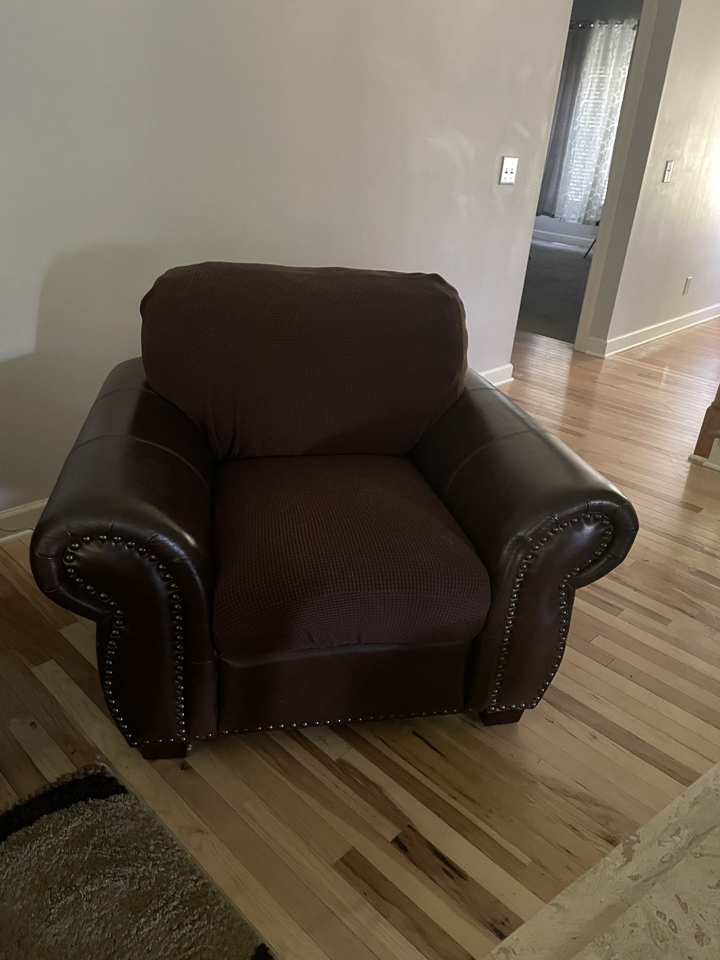 Two Couches And one Large Chair With Covers