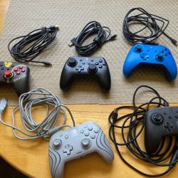 4 Nintendo/1Xbox Controllers 