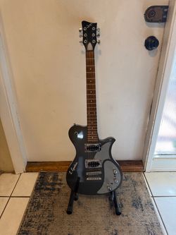 First Act Volkswagen (VW) Garage Master guitar. VE591 Electric Guitar SUPER RARE WITH SIGNATURE !! famous for their unique feature: a built-in pre-amp