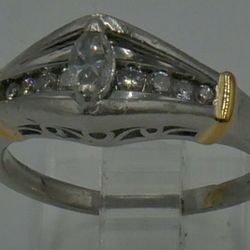 PLATINUM ENGAGEMENT RING 9.4GR WITH YELLOW GOLD AND DIAMONDS 0.50PTS (1 MARQUISE DIAMOND 0.20PTS 9 ROUND DIAMONDS 0.30PTS). SIZE 9.5. PRE OWNED. GOOD 