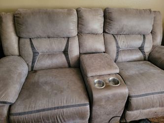 Tan and Brown Reclining Loveseat and Recliner