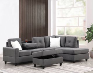 New gray sectional with storage ottoman, cupholder and free delivery