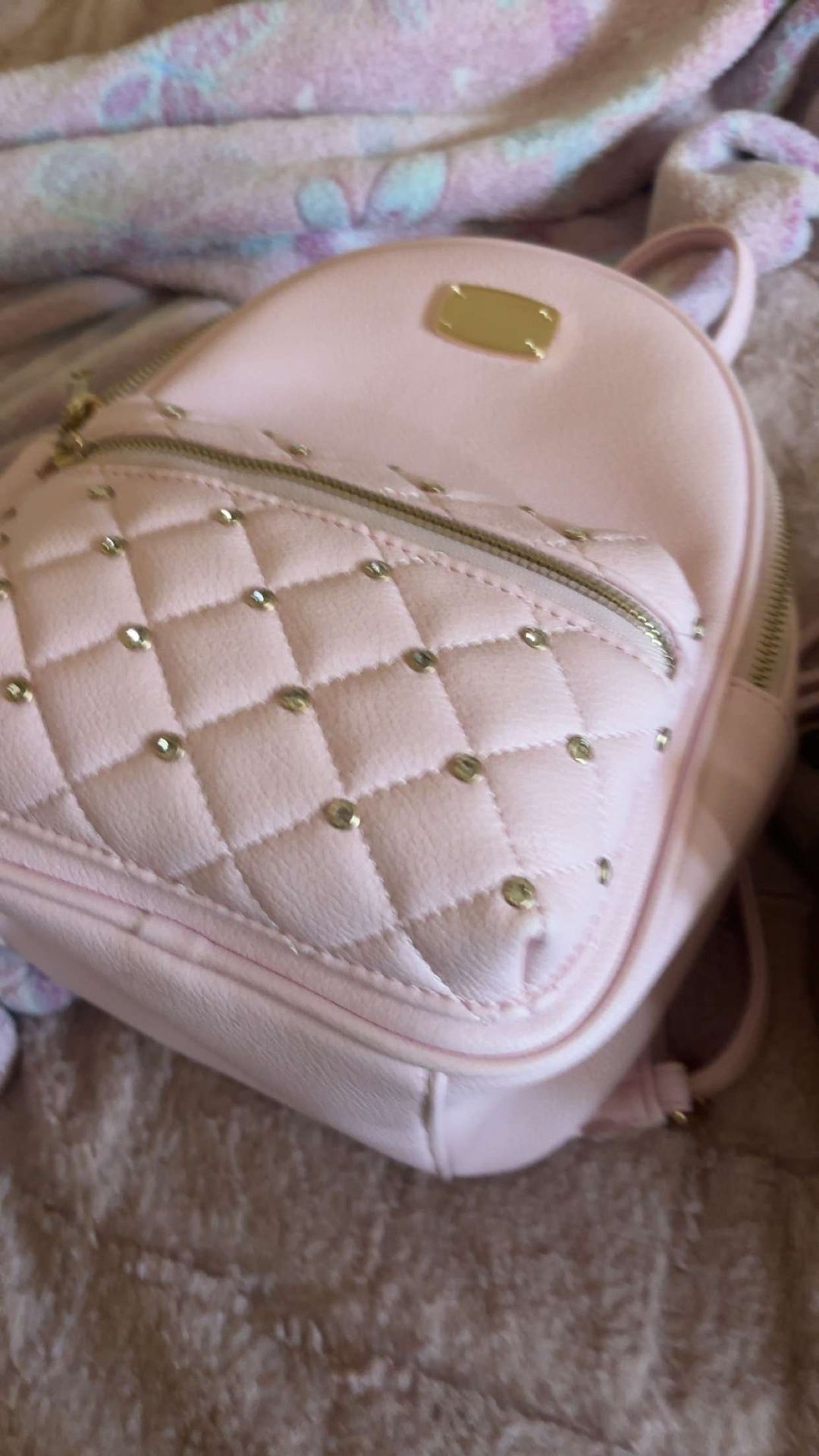 a pink mini Backpack