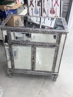 Mirrored Night stand cabinet.