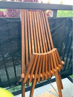 2 wooden foldable chairs
